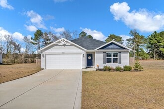 Building Photo - 3 Bedroom 2 Bathroom- Pets Okay!