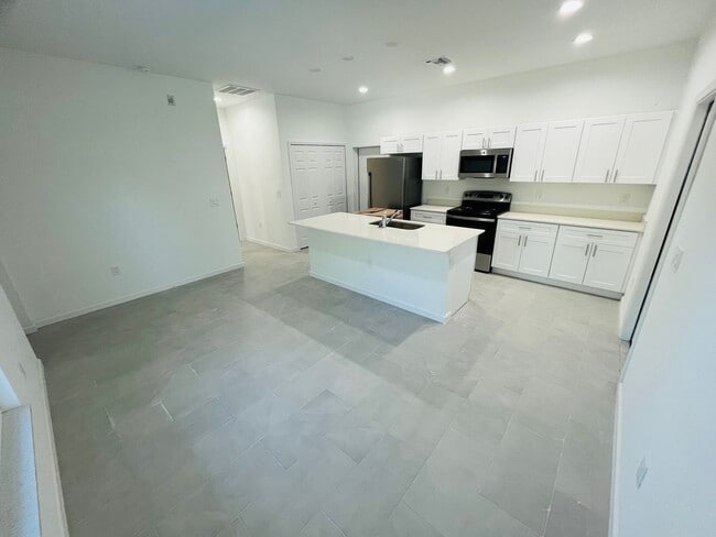 Building Photo - BRAND NEW ONE BEDROOM, ONE BATH-ONE CAR GARAGE- SOUTH LEHIGH ACRES