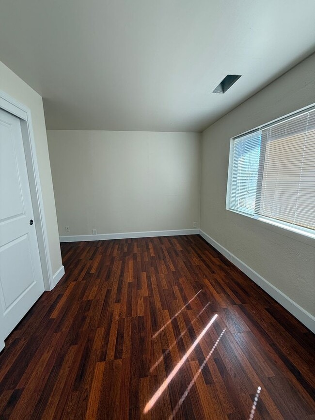 Building Photo - Charming Auburn Retreat with Vaulted Ceilings & Stone Fireplace