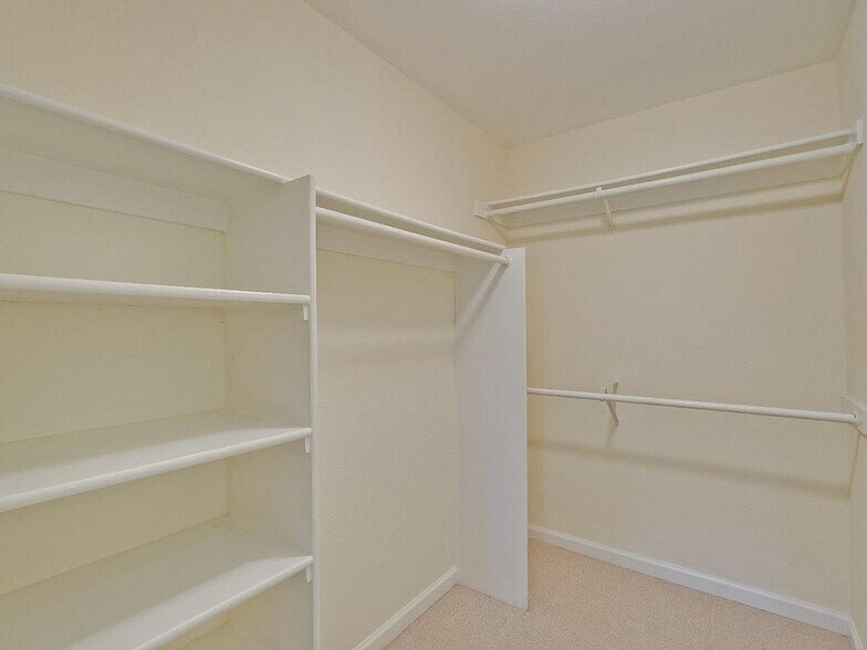 Primary closet - 684 Teatree Ct