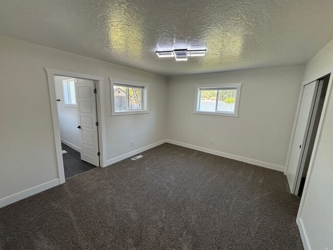 Building Photo - Beautifully Renovated 4-Bedroom Home with Finished Basement