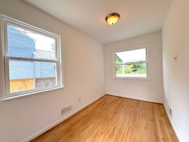 Building Photo - Charming 2BR Townhome with Finished Basement, Fenced Yard & Private Driveway Near Huntington Metro