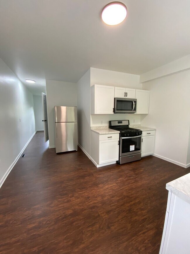 Building Photo - Available July 2026 - Completely renovated 3 bedroom home!