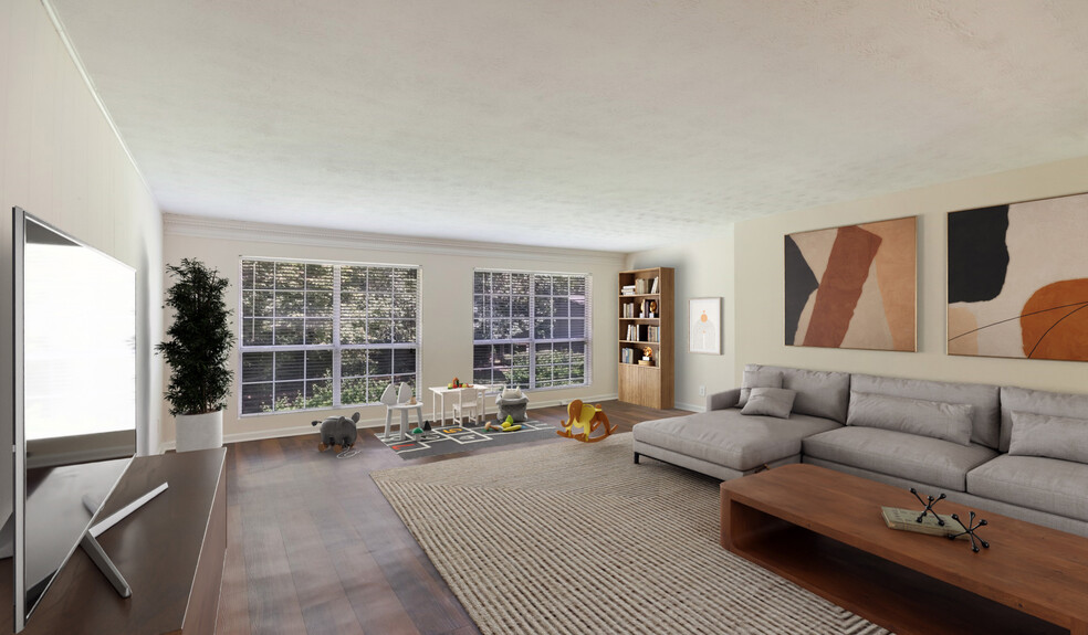 Spacious living rooms with great natural light - Peachtree Park Apartments