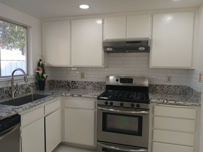 Building Photo - Stylish, Secure, and Pet-Friendly 3-Bedroo...