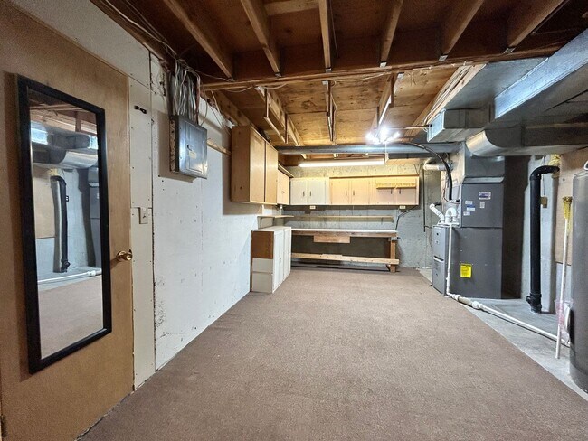 Building Photo - Spacious 3BR Duplex w/ Garage, Workshop, Large Backyard & Patio