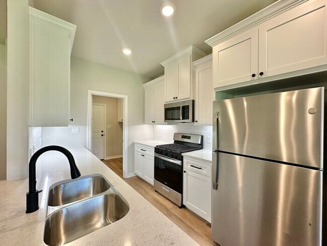 Building Photo - Tour Today! New Construction 4 Bed 2 Bath Triplex!