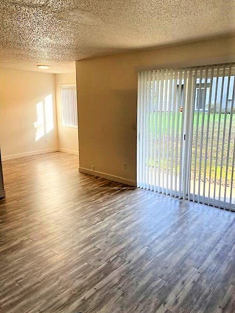 living room and dining room - Michael Manor Apartments