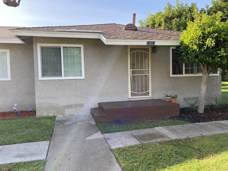 Beautiful corner condo that feels like a home surrounded by a green yard. - 23201 Anchor Avenue