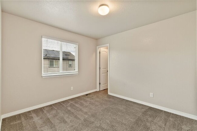 Building Photo - Spacious 3-Bedroom Home with Central A/C Near Fort Carson & Peterson