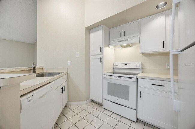 Building Photo - Location! Beautifully located condo just minutes from Orlando International Airport,