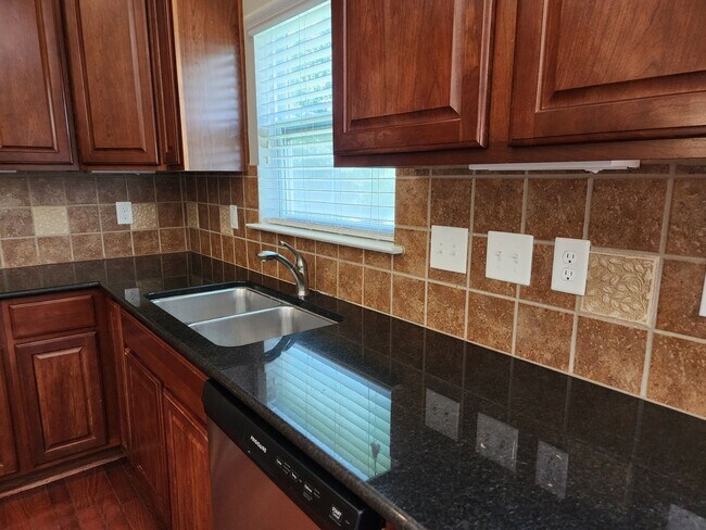 Building Photo - Quaint 4-Bedroom Home