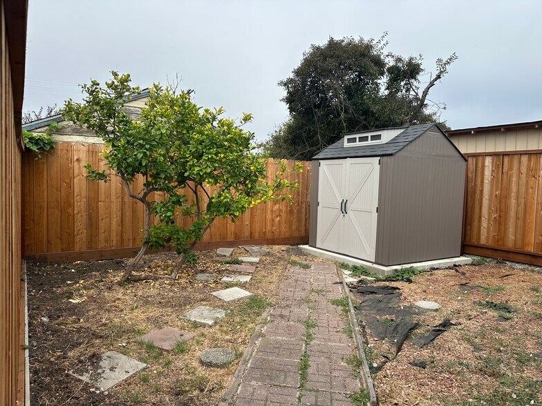 Low-maintenance outdoor space with included landscaping service. - 721 15th St