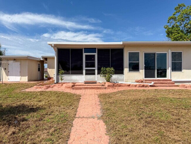 Building Photo - RENT THIS CANAL FRONT HOME WITH ZERO DEPOSIT DOWN
