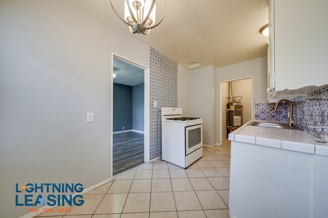 Building Photo - 6415 S Van Ness Ave