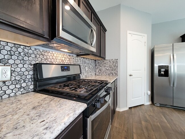 Building Photo - Welcome to your next home in the heart of Downtown Cleveland, Texas! This inviting 3-bedroom, 2-b...