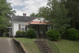 Building Photo - Four-Bedroom Bungalow with Fenced Yard Nea...