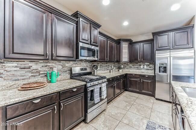 Building Photo - 7657 S Debra Dr