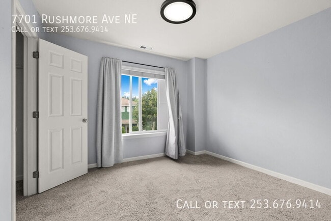 Building Photo - 7701 Rushmore Ave NE