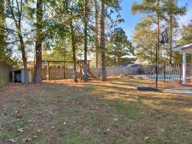 Primary Photo - 5 bedroom, 3.5 bathroom home with pool in ...