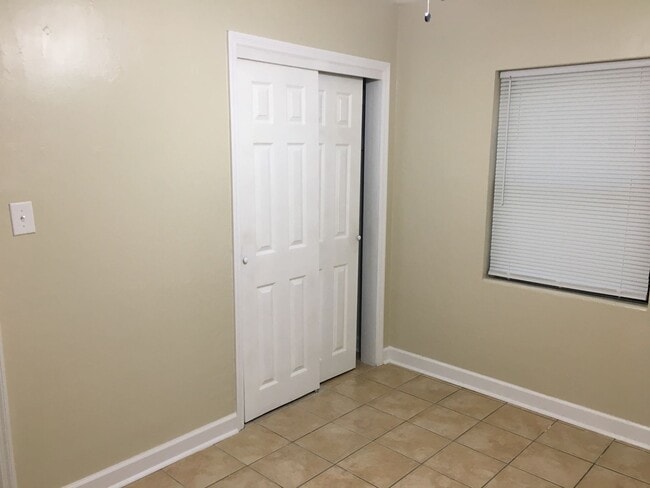 Building Photo - Charming home with a New Kitchen, tile flo...