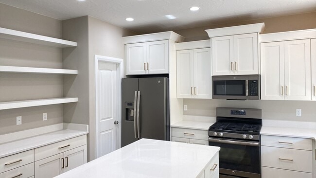 Building Photo - Spacious Two-Level Home with Modern Touches