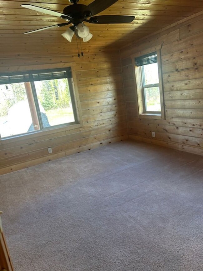 Building Photo - Gorgeous Log Home with infloor heat.  Two level lots with RV parking and dumpstation.