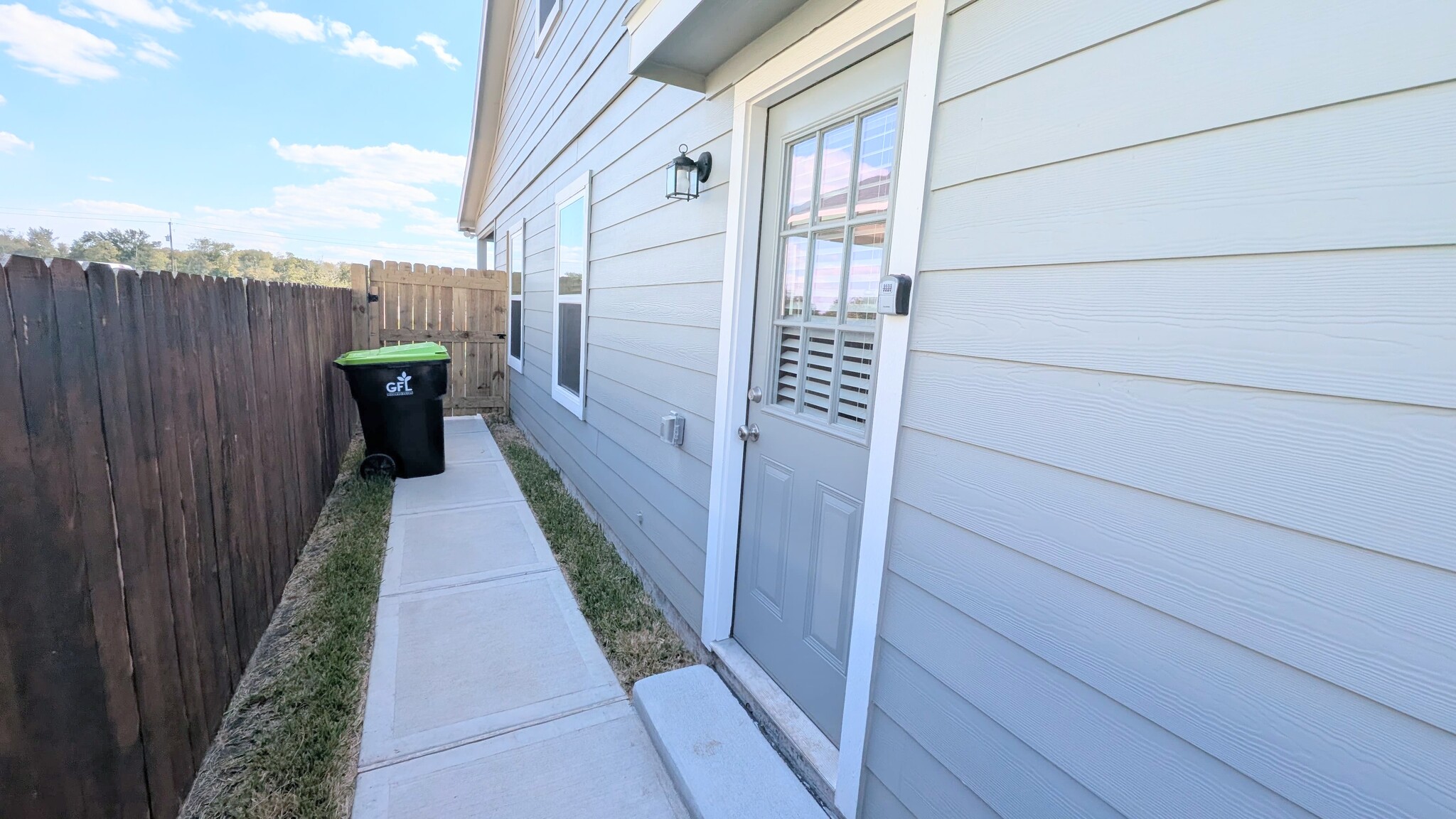 Also access the backyard from the side entrance off of the kitchen. - 13218 HP Johnson St