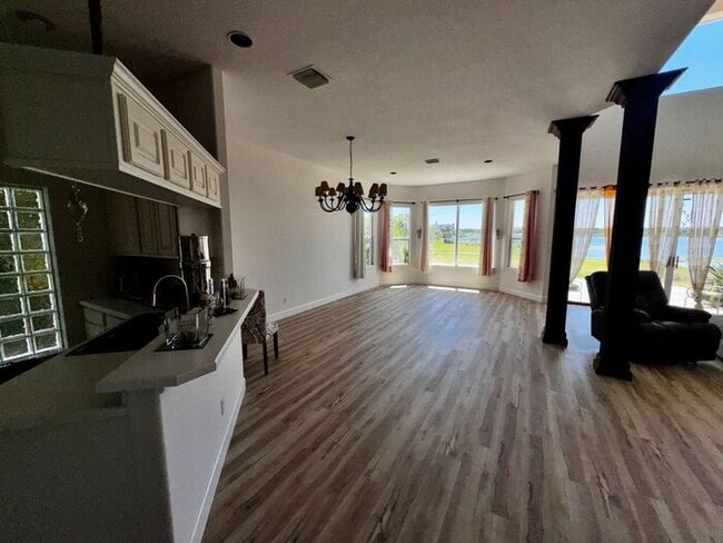 Building Photo - 3 Bedroom 2.5 Bath Cinnamon Bay Home with Stunning view, and Hardwood Flooring!