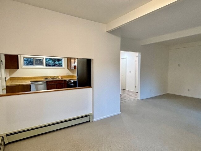 Building Photo - Updated 3BR Evergreen Home w/ Garage & Fenced Yard