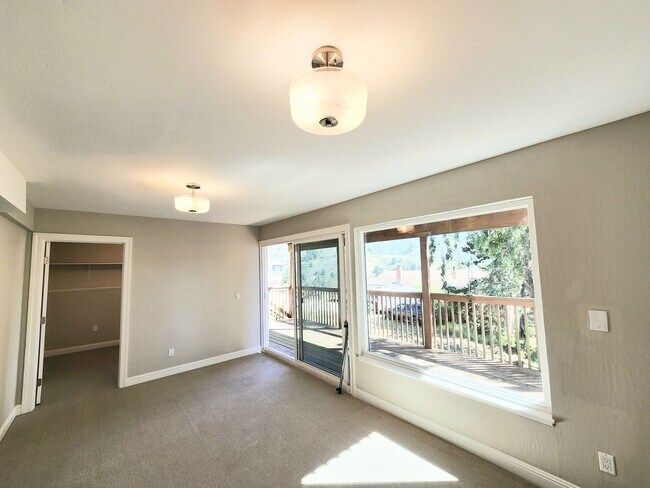 Building Photo - 3 bedroom 3 bathroom hillside Pacifica home with serene views
