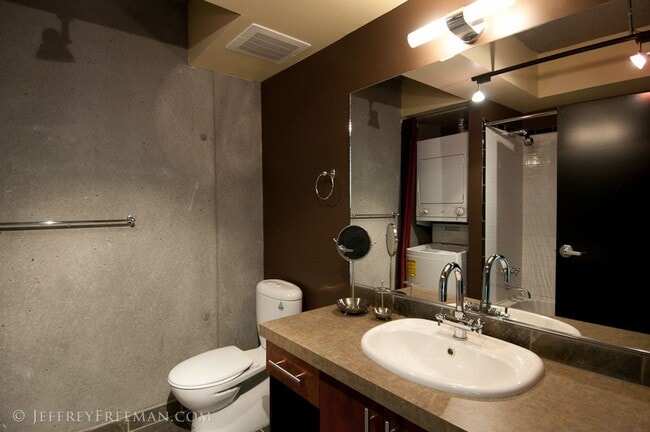 Building Photo - Stunning Penthouse Loft in the Mosaic Condos - Gas Fireplaces, A/C, W/D in unit!