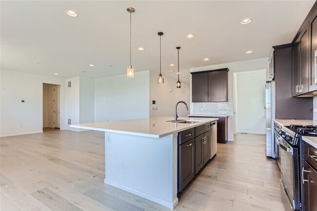 Building Photo - 3-Bedroom Home with Open Floor Plan, Private Balcony & Attached Garage