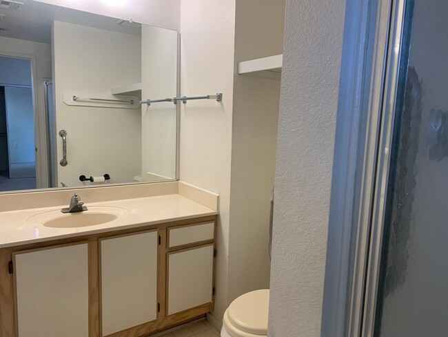 Building Photo - Cozy Condo in 55+ Community