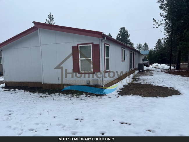 Building Photo - Cozy 2-Bed, 2-Bath Home with Off-Street Pa...