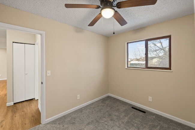 Building Photo - Spacious Split-Level Home with Finished Basement, Deck, Fenced Yard & 2-Car Garage