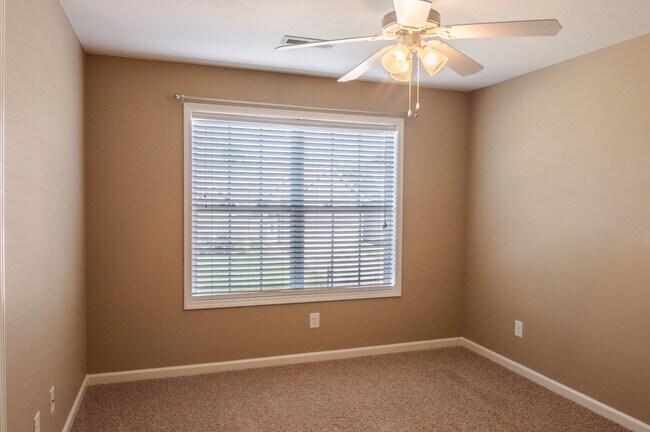 Building Photo - Pet Friendly Three Bedroom with Bonus!