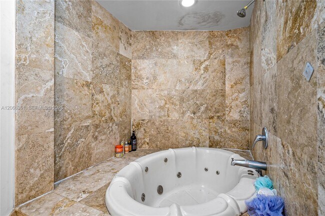 Building Photo - 6362 Collins Ave