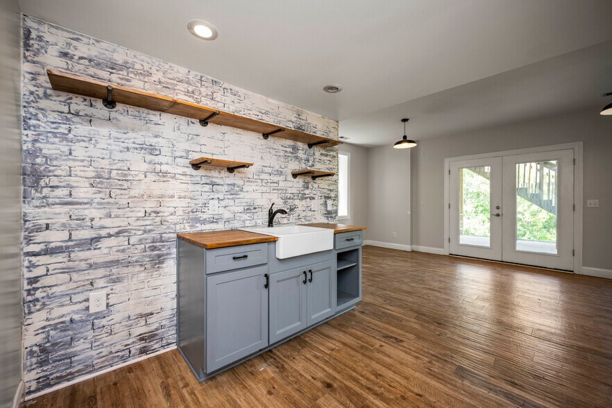 Walk-out Tiled Basement Kitchenette fitted for refrigerator, ice or freezer - 393 Hays Blvd
