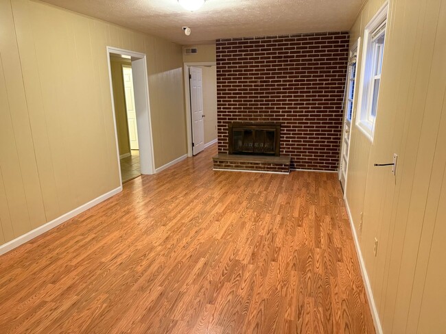 Building Photo - Updated 4BR Home with Finished Basement & Level Yard