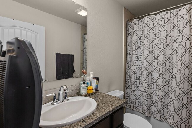 Building Photo - 9008 Rice Ave