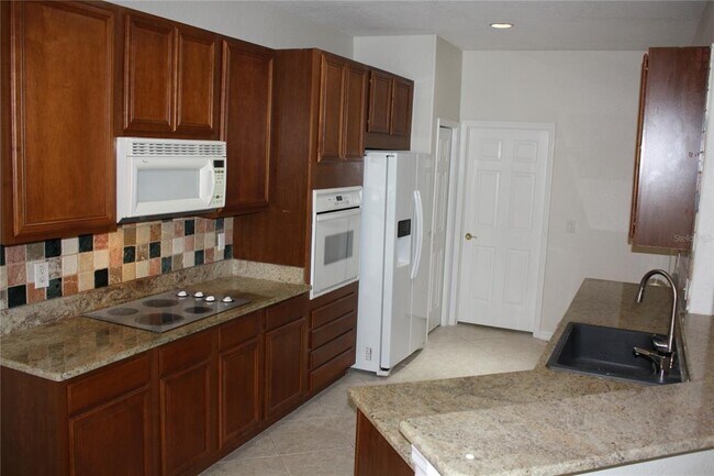 Building Photo - 9115 Pinebreeze Dr