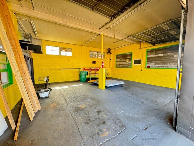 Building Photo - Prime Commercial Space for Rent in Downtown Granite Quarry - 1,323 Sq Ft with Bay Doors