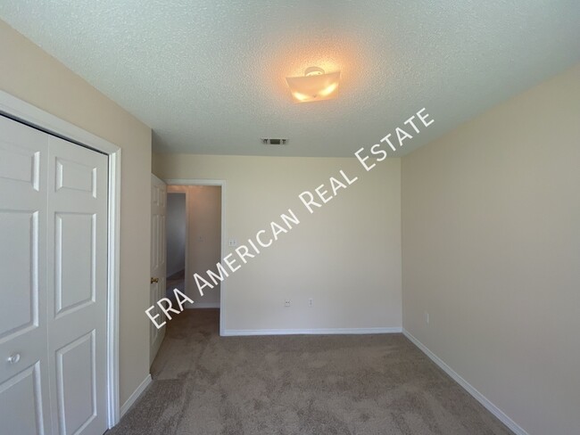 Building Photo - 7468 Woodmont Rd