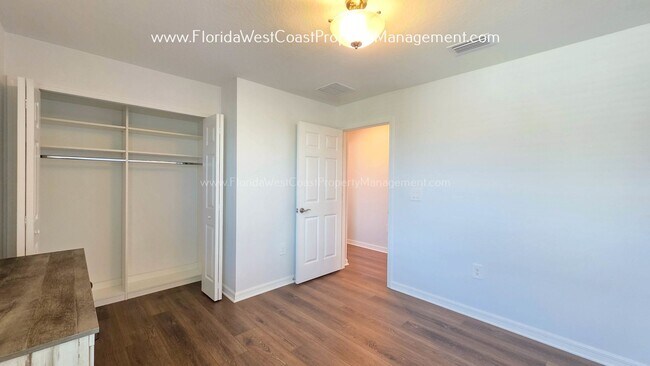 Building Photo - EXCEPTIONAL AND SPACIOUS FURNISHED TOWNHOME WITHIN WATERSIDE- NAUTIQUE!