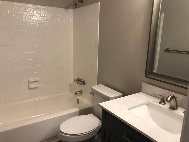 Building Photo - Charming 2BR Condo with Granite Countertops, Pool Access & Included Lawn Care
