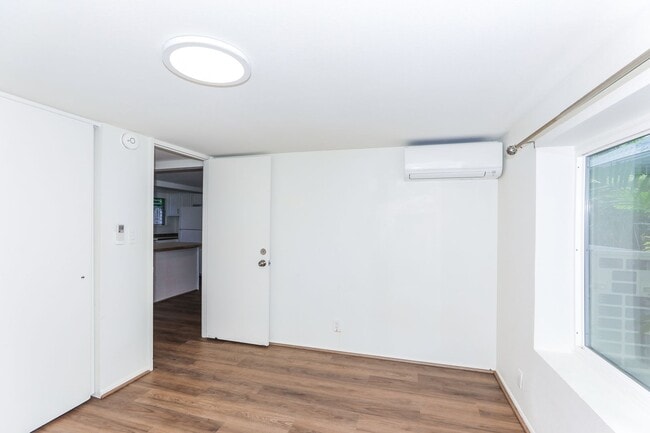 Building Photo - Kahala Avenue Beachside - remodeled 2 bedroom, 1 bath with Luxury Vinyl Plank Flooring