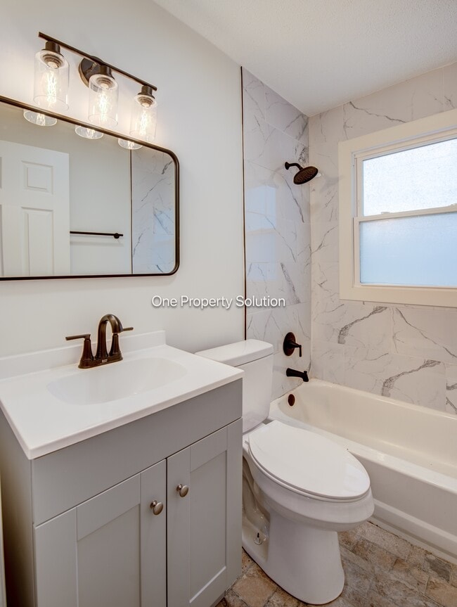 Building Photo - 1665 W 40th Ave