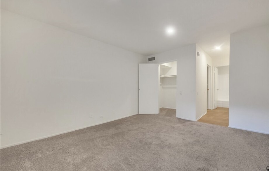 Carpet has been replaced with wood floor. Mounted 60” TV will be included - 5460 White Oak Ave