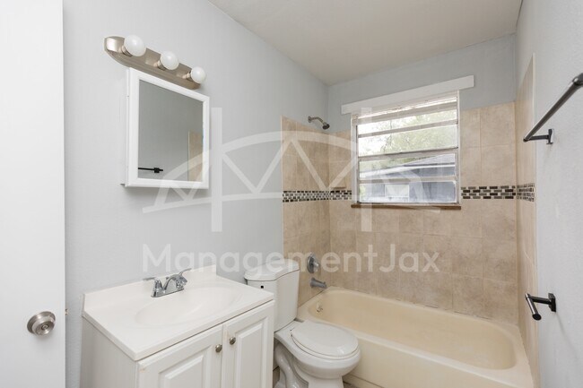 Building Photo - 5736 Teeler Ave